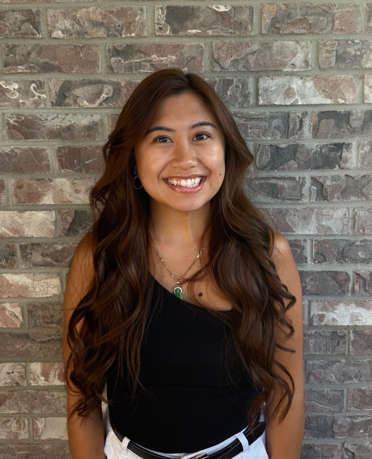 Anh Huynh, front desk coordinator at Woodlane Family & Cosmetic Dentistry