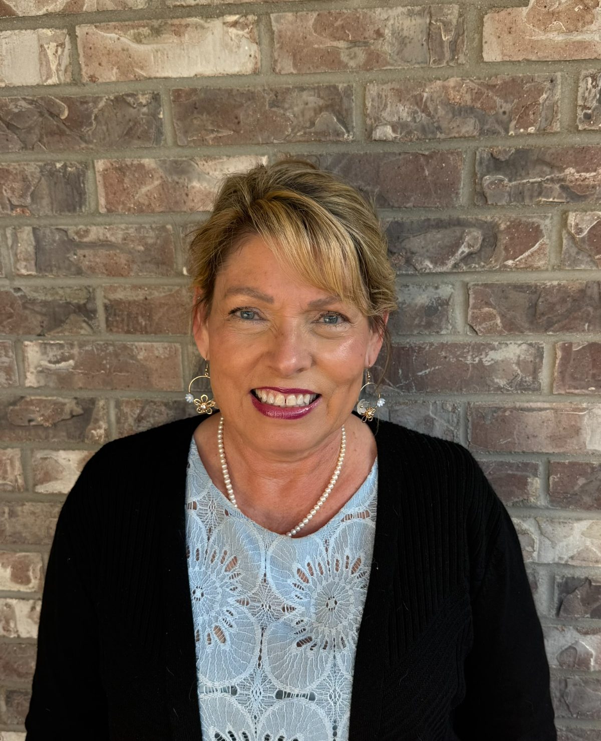 Kim Snyder, front desk coordinator at Woodlane Family & Cosmetic Dentistry