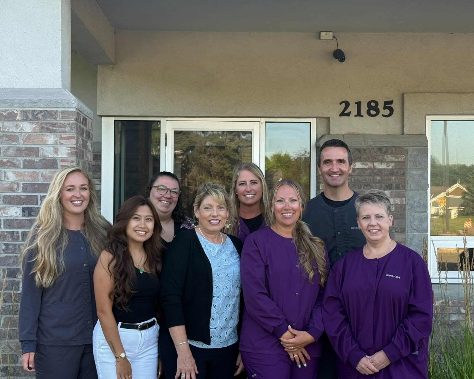 The Woodlane Family & Cosmetic Dentistry team outside our Woodbury, MN office